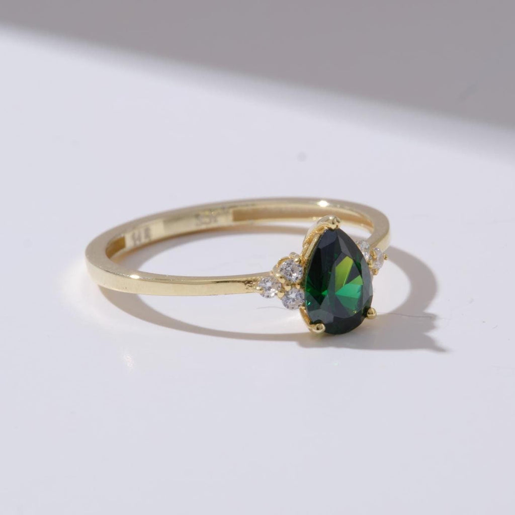 Pear Cut Side Stone Gold Birthstone Ring