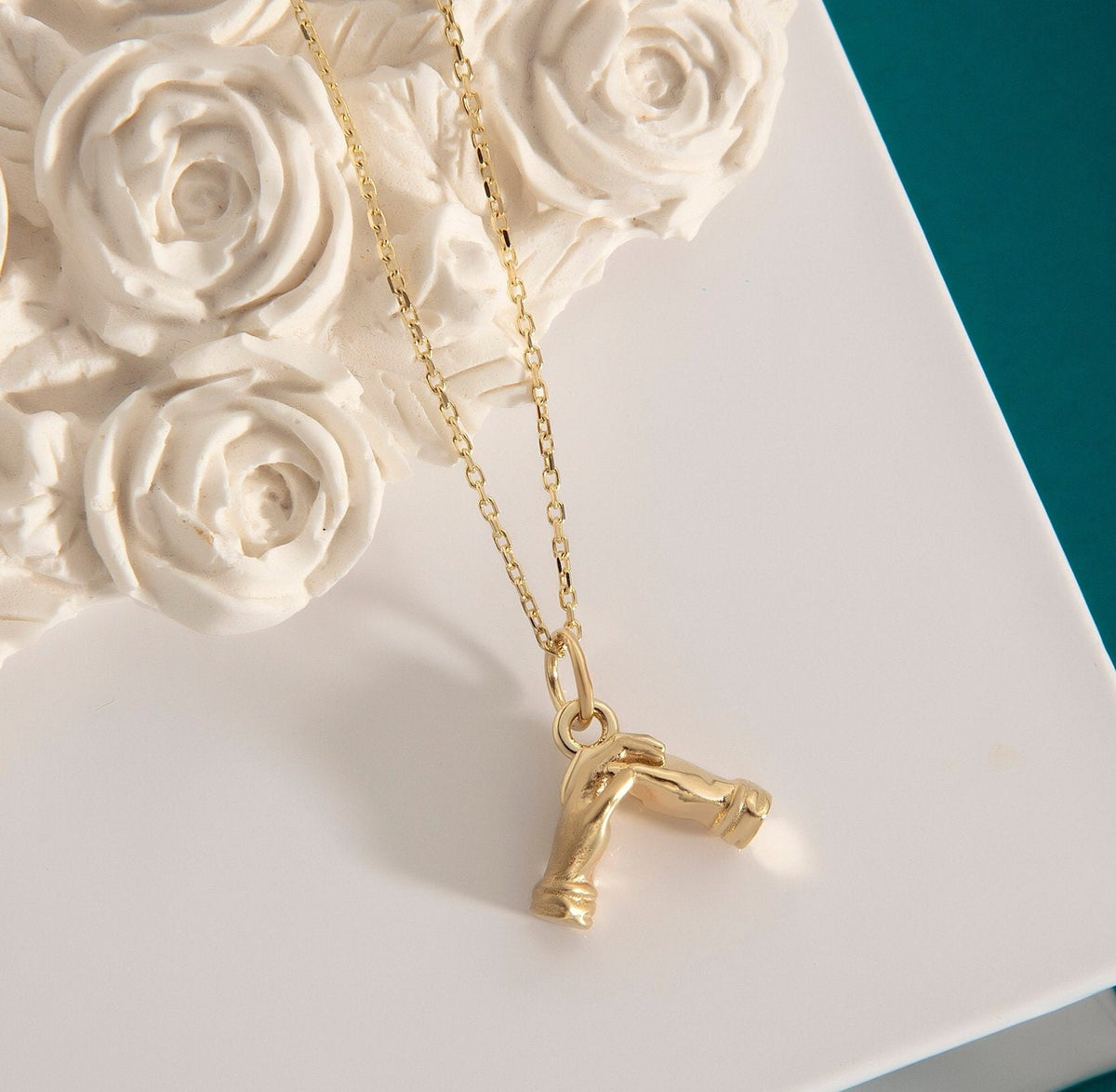 Gold Holding Hands Pendant