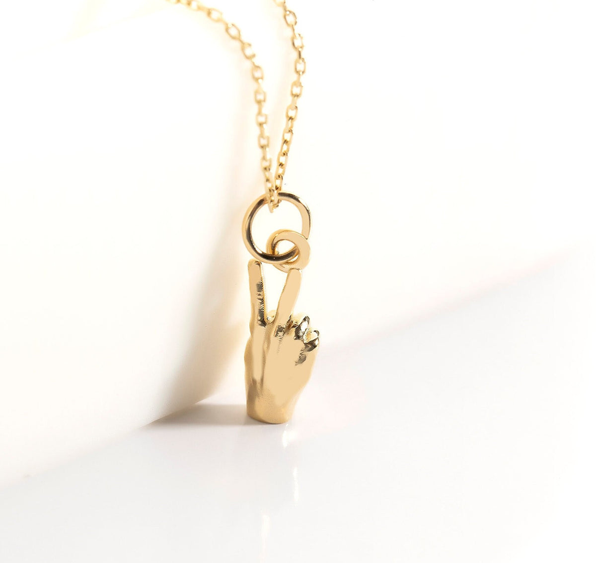 Gold Peace Sign Hand Pendant