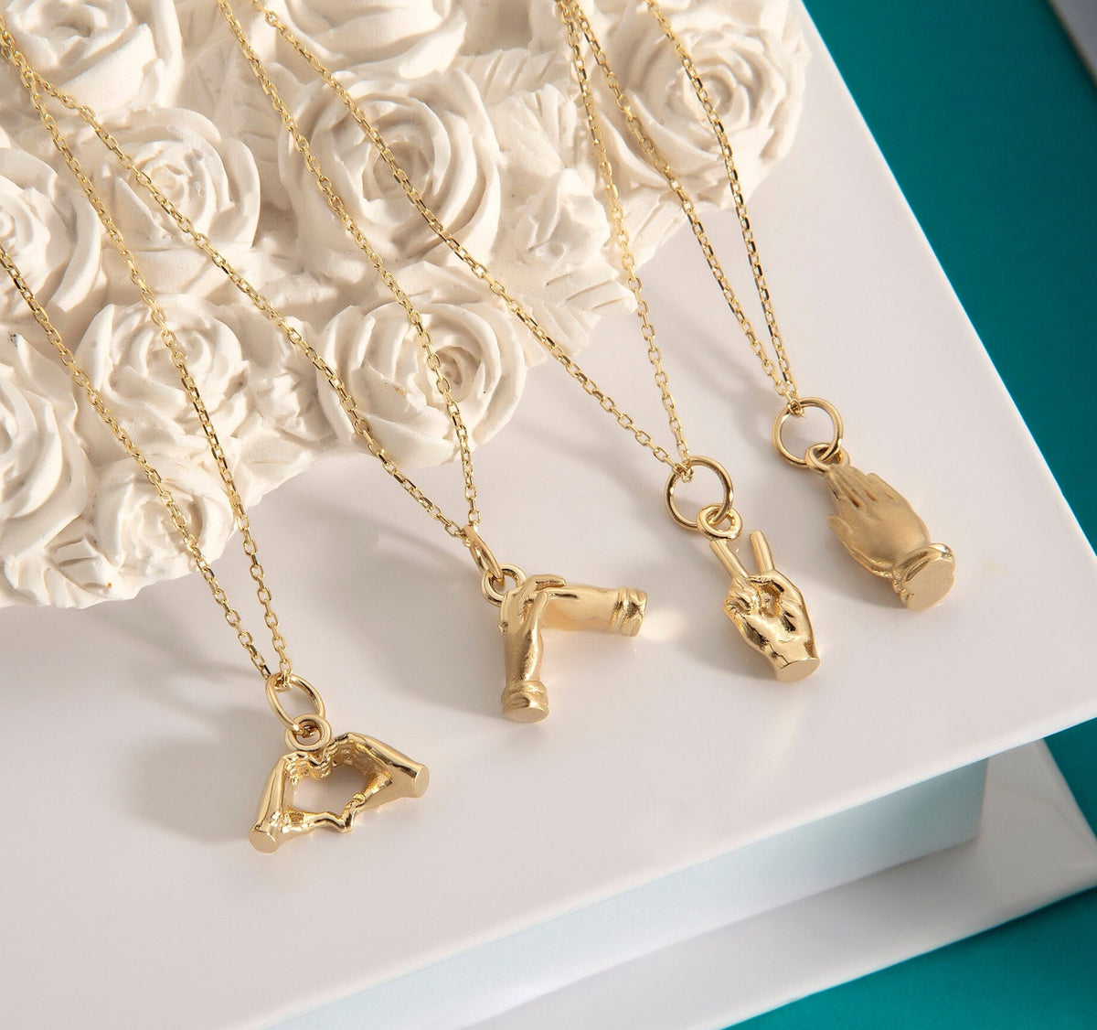 Gold Heart Hand Gesture Pendant