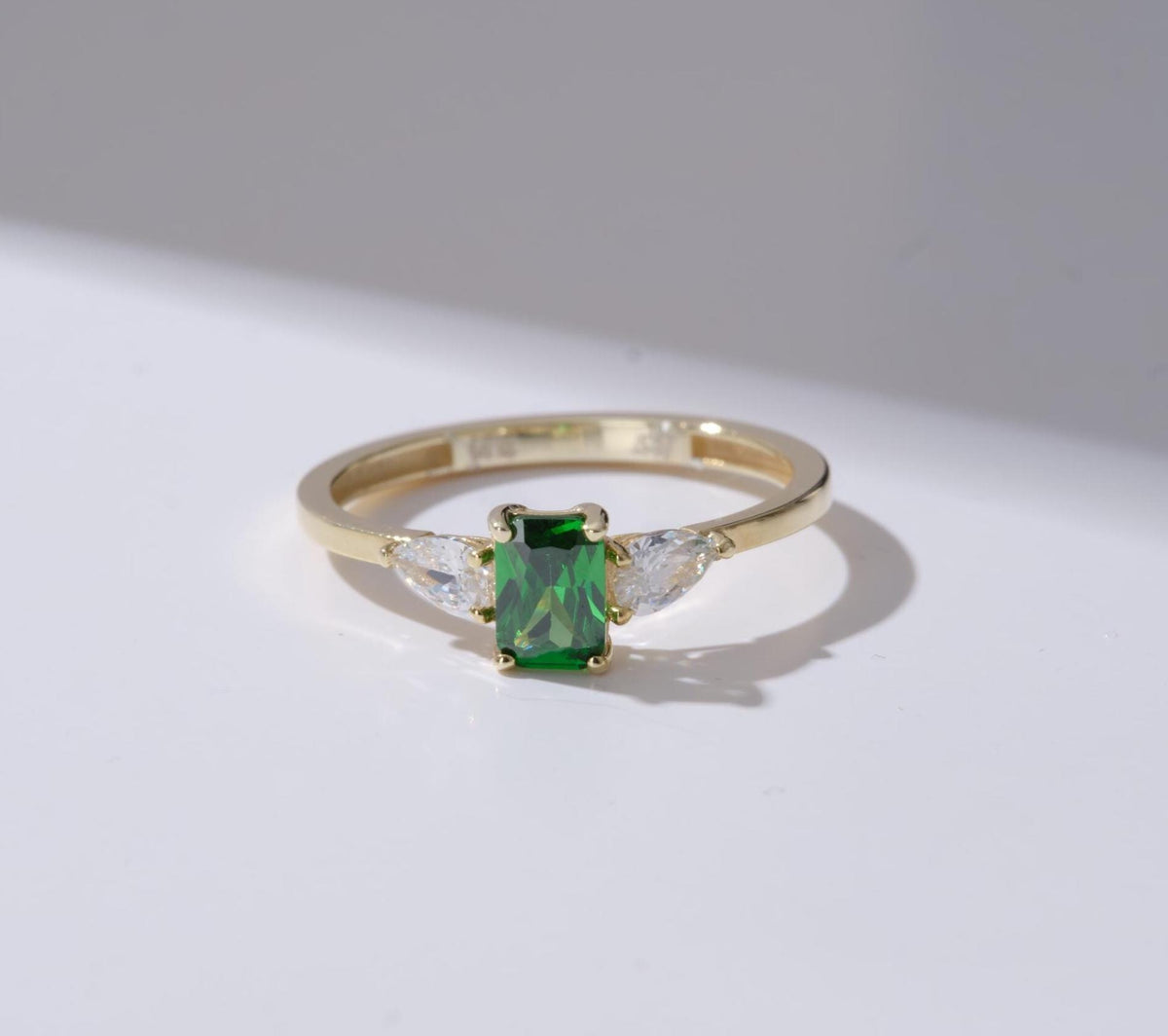 Emerald Cut Side Stone Gold Birthstone Ring