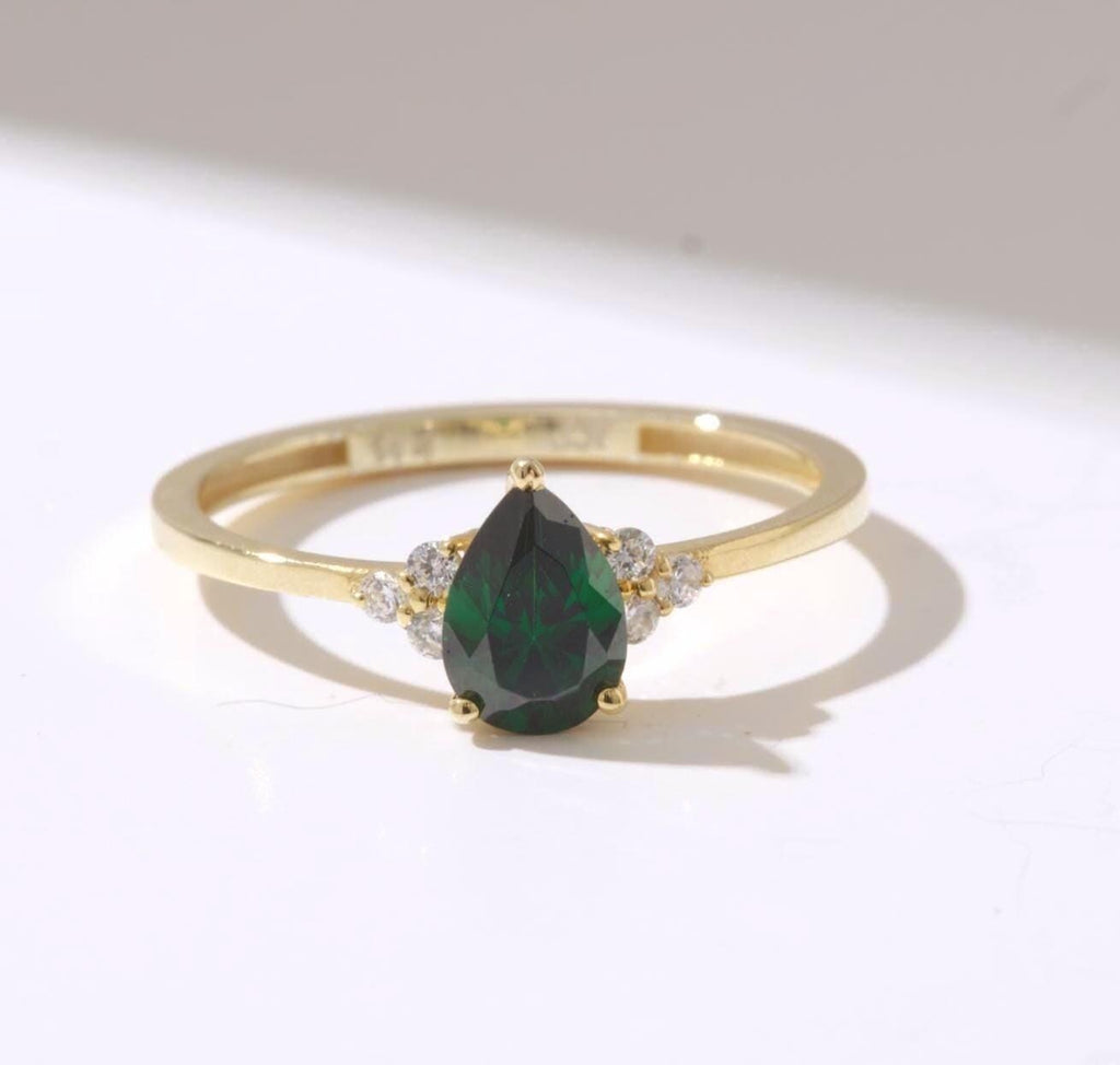 Pear Cut Side Stone Gold Birthstone Ring