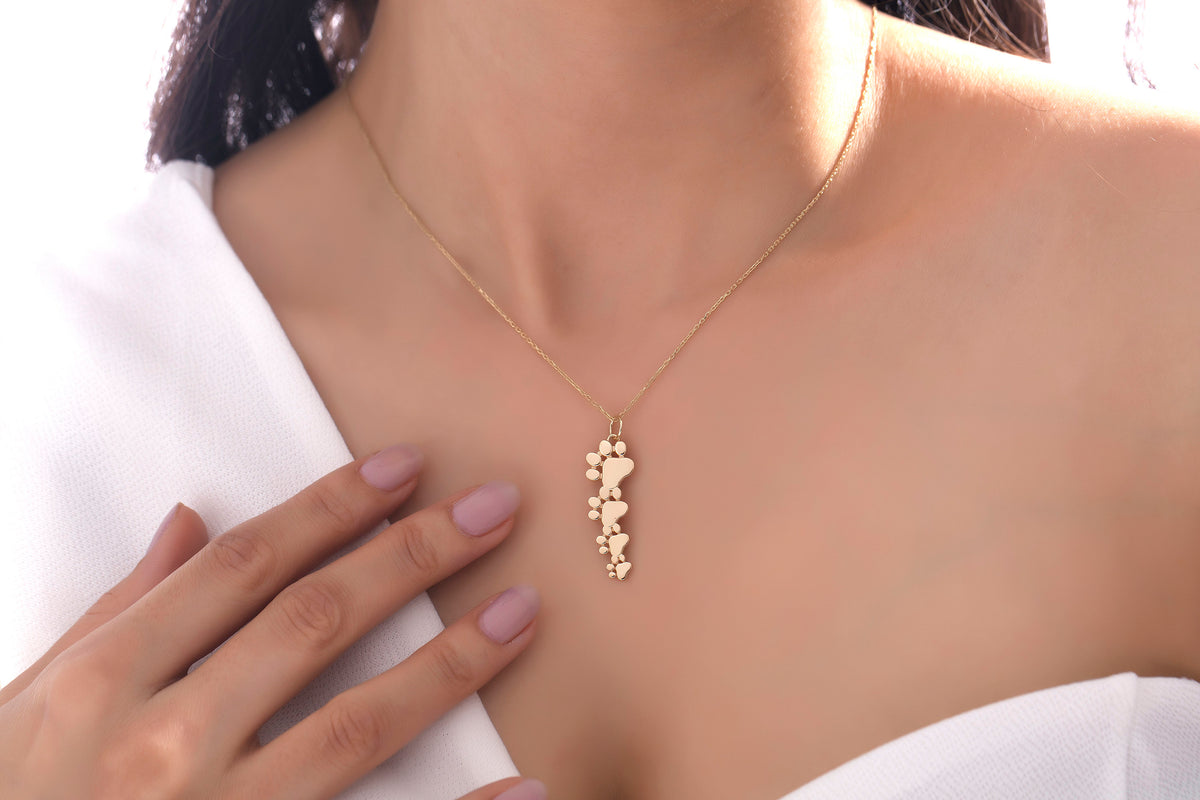 Gold Multi Paw Engraved Pendant