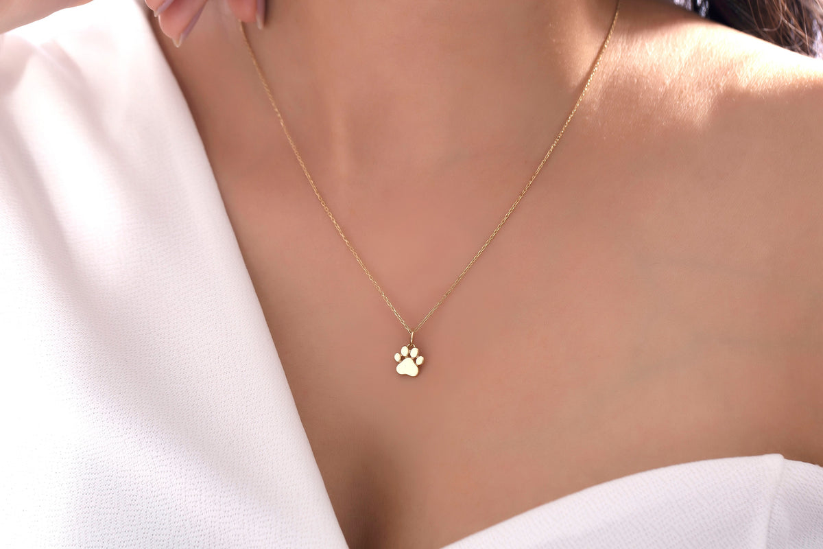 Gold Multi Paw Engraved Pendant
