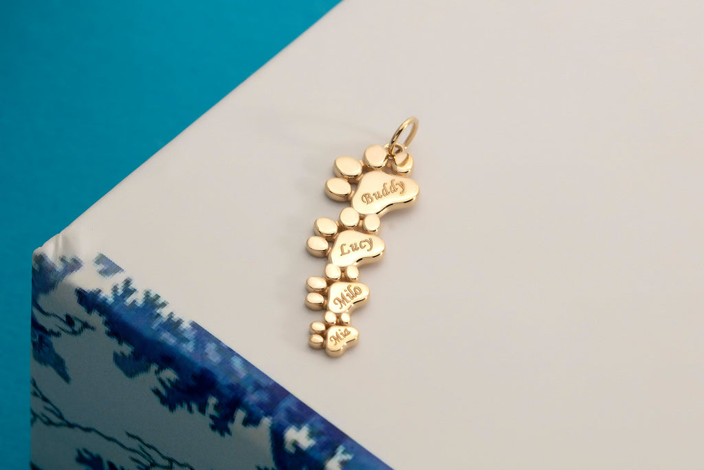 Gold Multi Paw Engraved Pendant